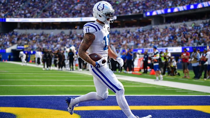 Sep 28, 2025; Inglewood, California, USA; Indianapolis Colts wide receiver Michael Pittman (11) scores a touchdown against the Los Angeles Rams during the second half at SoFi Stadium. Mandatory Credit: Gary A. Vasquez-Imagn Images