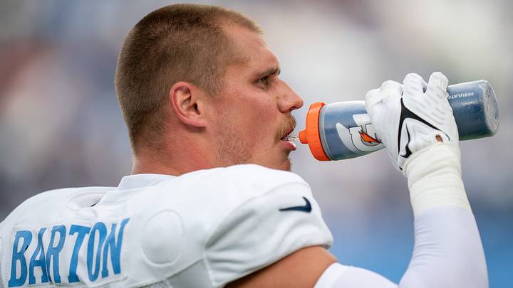Tennessee Titans linebacker Cody Barton (50) breaks for water during the Blue and White Stadium Scrimmage at Nissan Stadium in Nashville, Tenn., Friday, Aug. 7, 2026. Tennessee Titans linebacker Cody Barton (50) breaks for water during the Blue and White Stadium Scrimmage at Nissan Stadium in Nashville, Tenn., Friday, Aug. 7, 2026.