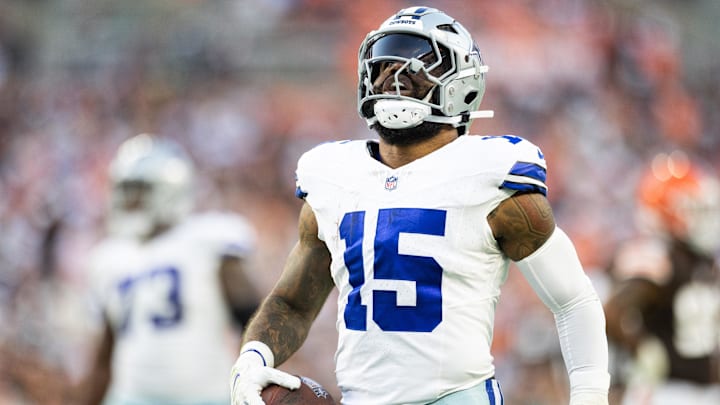 Dallas Cowboys running back Ezekiel Elliott (15) celebrates his first down run against the Cleveland Browns during the fourth quarter at Huntington Bank Field.