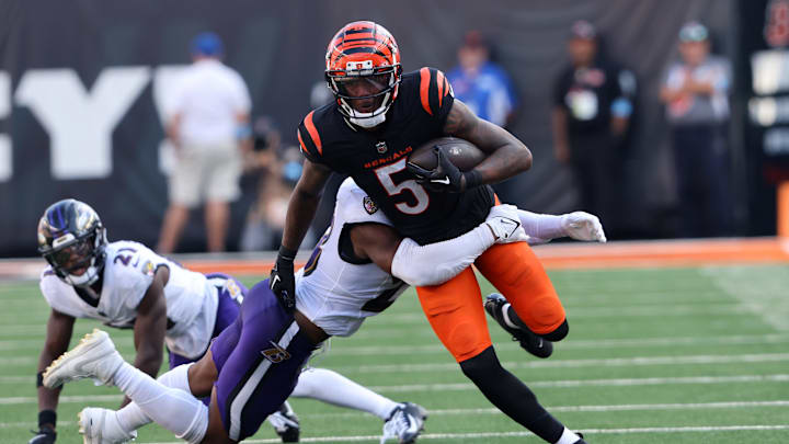 Oct 6, 2024; Cincinnati, Ohio, USA; Cincinnati Bengals wide receiver Tee Higgins (5) runs after making a catch during the second half against the Baltimore Ravens at Paycor Stadium.