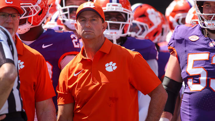 Sep 13, 2025; Atlanta, Georgia, USA; Clemson Tigers head coach Dabo Swinney prepares to run on the field with his team before a game against the Georgia Tech Yellow Jackets at Bobby Dodd Stadium at Hyundai Field. Mandatory Credit: Brett Davis-Imagn Images