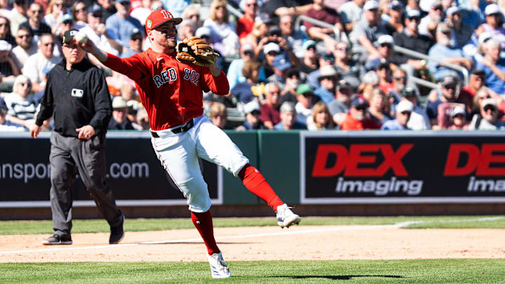 Caleb Durbin of the Boston Red Sox throws an out during spring training game against the Pittsburgh Pirates at JetBlue Park in Fort Myers on Tuesday, Feb. 24, 2026. I
