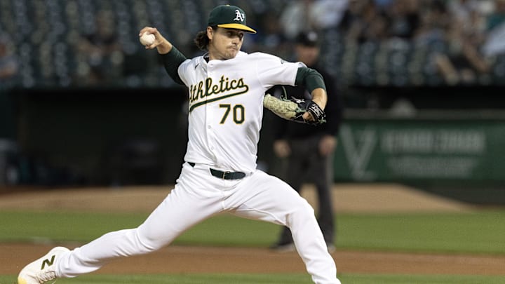 Sep 3, 2024; Oakland, California, USA; Oakland Athletics starting pitcher J.T. Ginn (70) delivers a pitch against the Seattle Mariners during the fourth inning at Oakland-Alameda County Coliseum. Mandatory Credit: D. Ross Cameron-Imagn Images
