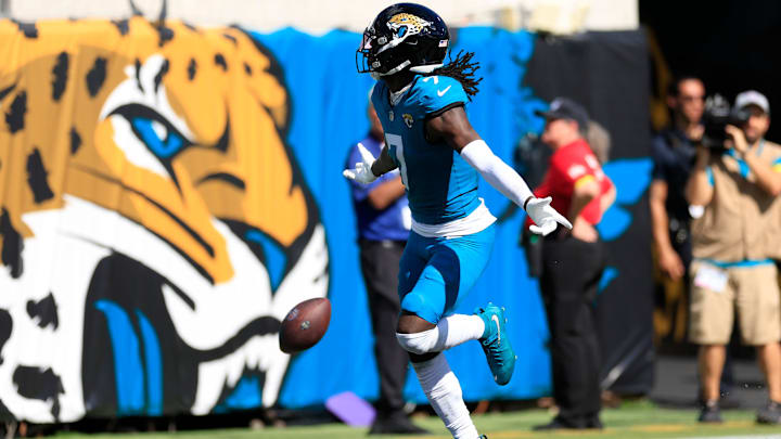 Jacksonville Jaguars wide receiver Brian Thomas Jr. runs the ball for a touchdown.