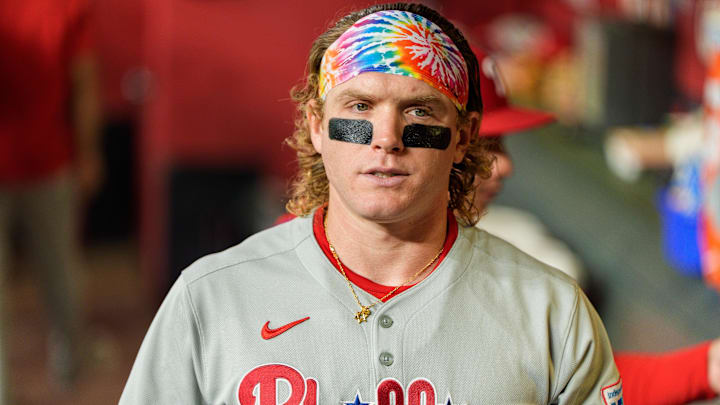 Philadelphia Phillies outfielder Harrison Bader walks in the dugout. Philadelphia Phillies outfielder Harrison Bader walks in the dugout.
