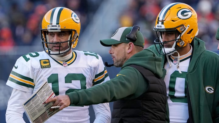 Green Bay Packers quarterback Aaron Rodgers (12) and quarterback Jordan Love (10) listen to head coach Matt LaFleur during the fourth quarter of their game Sunday, December 4, 2022 at Soldier Field in Chicago, Ill. The Green Bay Packers beat the Chicago Bears 28-19. Green Bay Packers quarterback Aaron Rodgers (12) and quarterback Jordan Love (10) listen to head coach Matt LaFleur during the fourth quarter of their game Sunday, December 4, 2022 at Soldier Field in Chicago, Ill. The Green Bay Packers beat the Chicago Bears 28-19.