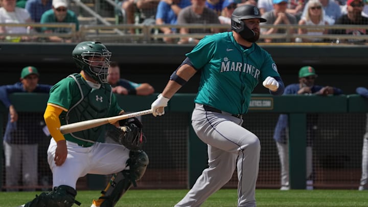 Seattle Mariners first baseman Rowdy Tellez hits during a spring training game against the Athletics on March 17 at Hohokam Stadium. Seattle Mariners first baseman Rowdy Tellez hits during a spring training game against the Athletics on March 17 at Hohokam Stadium.