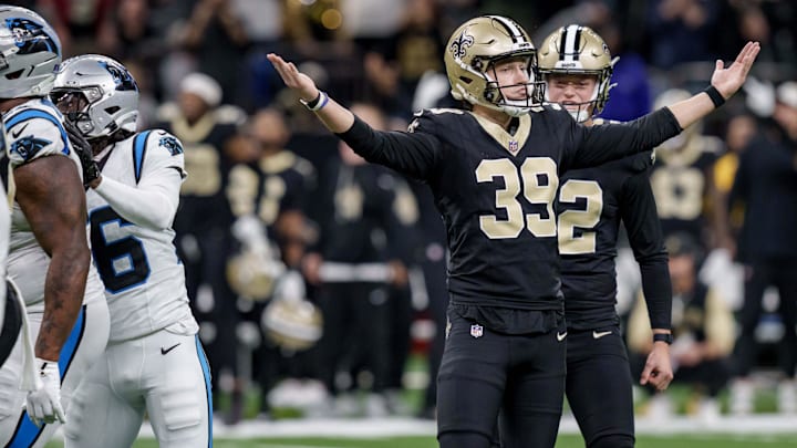 Dec 14, 2025; New Orleans, Louisiana, USA; New Orleans Saints kicker Charlie Smyth (39) celebrates after a field goal to win the game against the Carolina Panthers at Caesars Superdome. Mandatory Credit: Matthew Hinton-Imagn Images