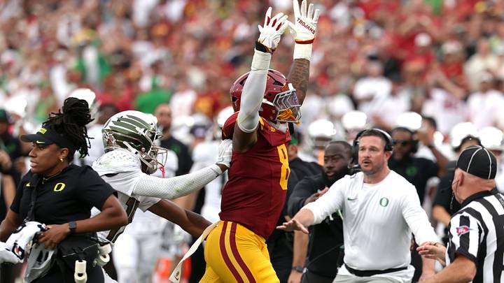 Sep 26, 2026; Los Angeles, California, USA; USC Trojans linebacker Desman Stephens II (8) reacts after tackling Oregon Ducks quarterback Dante Moore (not pictured) before he is charged with targeting during the second quarter at United Airlines Field at Los Angeles Memorial Coliseum. Mandatory Credit: Kiyoshi Mio-Imagn Images Sep 26, 2026; Los Angeles, California, USA; USC Trojans linebacker Desman Stephens II (8) reacts after tackling Oregon Ducks quarterback Dante Moore (not pictured) before he is charged with targeting during the second quarter at United Airlines Field at Los Angeles Memorial Coliseum. Mandatory Credit: Kiyoshi Mio-Imagn Images