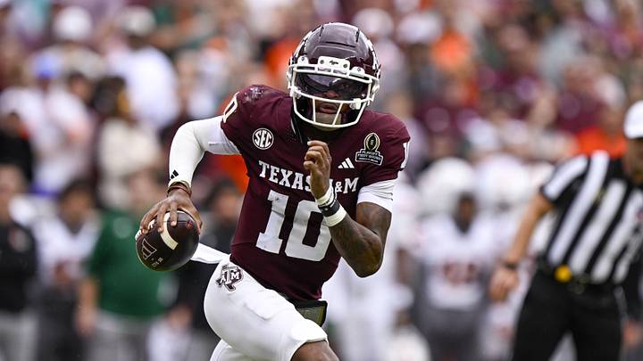 Dec 20, 2025; College Station, TX, USA; Texas A&M Aggies quarterback Marcel Reed (10) runs with the ball during the game between the Aggies and the Hurricanes at Kyle Field. Mandatory Credit: Jerome Miron-Imagn Images Dec 20, 2025; College Station, TX, USA; Texas A&M Aggies quarterback Marcel Reed (10) runs with the ball during the game between the Aggies and the Hurricanes at Kyle Field. Mandatory Credit: Jerome Miron-Imagn Images