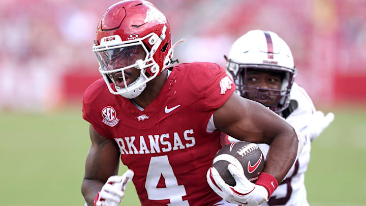 Arkansas Razorbacks running back Mike Washington Jr rushes during the fourth quarter against the Alabama A&M Bulldogs.