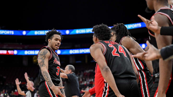Dec 20, 2025; Newark, New Jersey, USA; Houston Cougars guard Ramon Walker Jr. (3) reacts after making a shot against the Arkansas Razorbacks during the second half at Prudential Center. Mandatory Credit: John Jones-Imagn Images