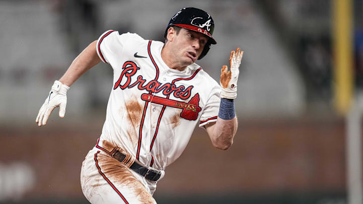 Apr 26, 2023; Cumberland, Georgia, USA;  Atlanta Braves pinch runner Nick Solak (15) scores a run against the Miami Marlins during the eighth inning at Truist Park. Mandatory Credit: Dale Zanine-Imagn Images