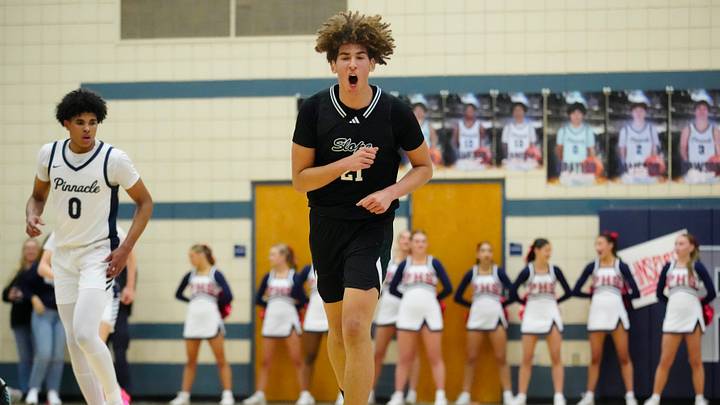 Sunnyslope center Darius Wabbington (21) yells after hitting a three-pointer against Pinnacle during a game at Pinnacle High School in Phoenix on Jan. 12, 2024.