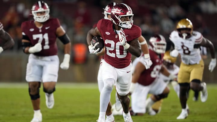Sep 13, 2025; Stanford, California, USA; Stanford Cardinal running back Micah Ford (20) carries the ball against the Boston College Eagles during the fourth quarter at Stanford Stadium. Mandatory Credit: Darren Yamashita-Imagn Images Sep 13, 2025; Stanford, California, USA; Stanford Cardinal running back Micah Ford (20) carries the ball against the Boston College Eagles during the fourth quarter at Stanford Stadium. Mandatory Credit: Darren Yamashita-Imagn Images