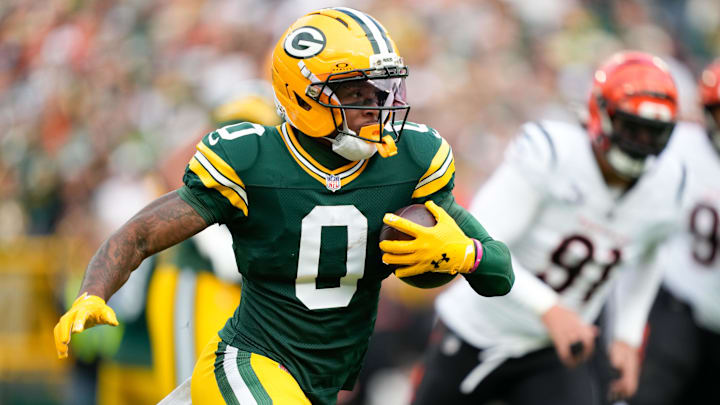 Oct 12, 2025; Green Bay, Wisconsin, USA; Green Bay Packers wide receiver Matthew Golden (0) runs with the ball during the first quarter against the Cincinnati Bengals at Lambeau Field. Mandatory Credit: Kayla Wolf-Imagn Images