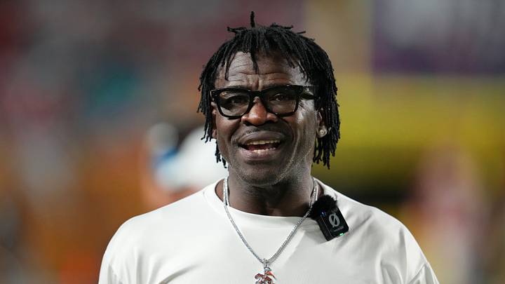 Jan 19, 2026; Miami Gardens, FL, USA; Miami Hurricanes former player Michael Irvin walks on the sideline during halftime of the College Football Playoff National Championship game at Hard Rock Stadium. Mandatory Credit: Kirby Lee-Imagn Images Jan 19, 2026; Miami Gardens, FL, USA; Miami Hurricanes former player Michael Irvin walks on the sideline during halftime of the College Football Playoff National Championship game at Hard Rock Stadium. Mandatory Credit: Kirby Lee-Imagn Images