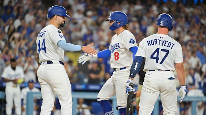 Sep 16, 2025; Los Angeles, California, USA; Los Angeles Dodgers first baseman Enrique Hernandez (8) celebrates a two-run home run with center fielder Andy Pages (44) during the second inning against the Philadelphia Phillies at Dodger Stadium. Mandatory Credit: Jayne Kamin-Oncea-Imagn Images