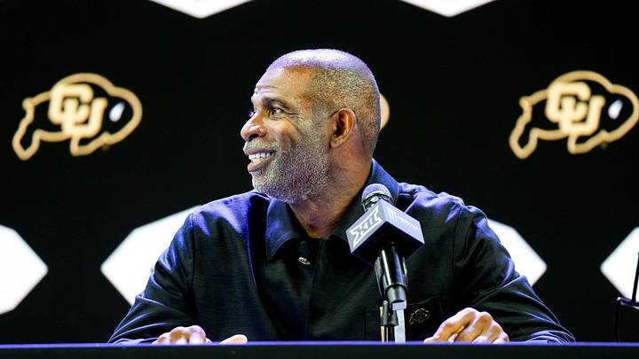 Jul 7, 2026; Frisco, TX, USA; Colorado head coach Deion Sanders speaks to reporters during Big 12 Conference Football Media Days at The Star. Mandatory Credit: Raymond Carlin III-Imagn Images Jul 7, 2026; Frisco, TX, USA; Colorado head coach Deion Sanders speaks to reporters during Big 12 Conference Football Media Days at The Star. Mandatory Credit: Raymond Carlin III-Imagn Images