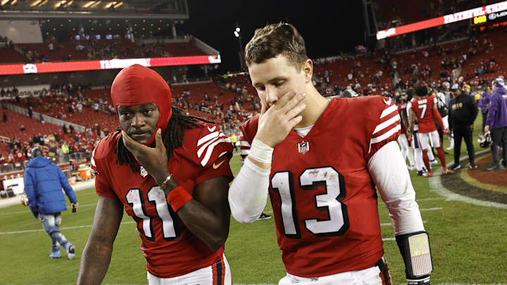 San Francisco 49ers wide receiver Brandon Aiyuk (L) and quarterback Brock Purdy (R)