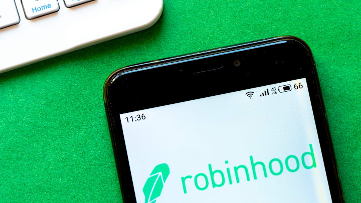 In this photo illustration a Robinhood logo seen displayed...