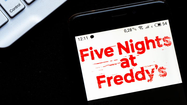 FNAF is a long-running horror franchise popularised by gamers and theorists, with a passionate fan community.