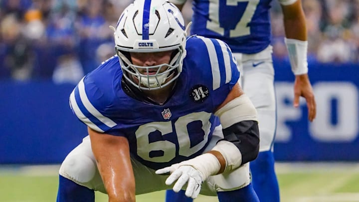 Indianapolis Colts guard Tanor Bortolini (60) hikes the ball to Indianapolis Colts quarterback Daniel Jones (17) on Saturday, Aug. 16, 2025, during a game against the Green Bay Packers at Lucas Oil Stadium in Indianapolis.
