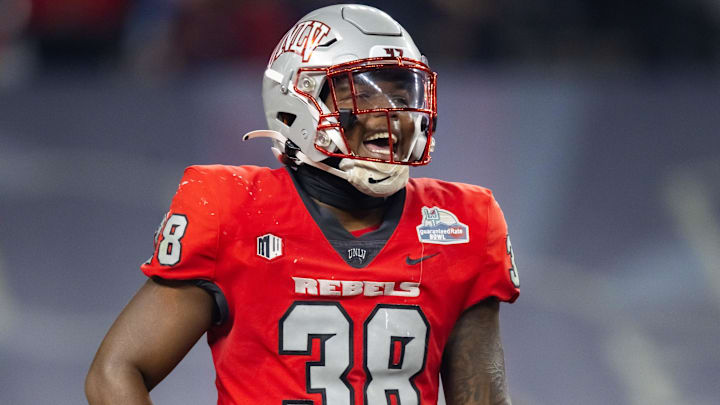 UNLV Rebels linebacker Marsel McDuffie (38) against the Kansas Jayhawks in the Guaranteed Rate Bowl at Chase Field. Mandatory Credit: Mark J. Rebilas-USA TODAY Sports UNLV Rebels linebacker Marsel McDuffie (38) against the Kansas Jayhawks in the Guaranteed Rate Bowl at Chase Field. Mandatory Credit: Mark J. Rebilas-USA TODAY Sports