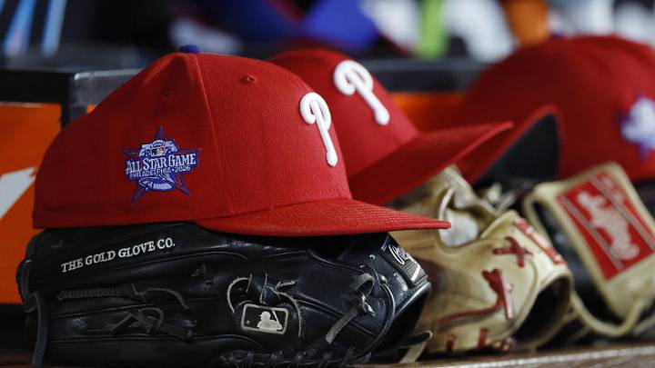 May 2, 2026; Miami, Florida, USA; Philadelphia Phillies starting hats and gloves sit on the bench against the Miami Marlins during the fifth inning at loanDepot Park. May 2, 2026; Miami, Florida, USA; Philadelphia Phillies starting hats and gloves sit on the bench against the Miami Marlins during the fifth inning at loanDepot Park.