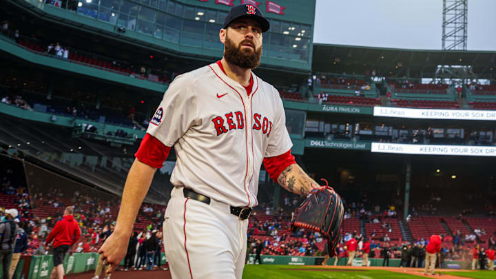 Boston Red Sox pitcher Lucas Giolito (54) makes his way to the bullpen before the start of the game against the Texas Rangers at Fenway Park.