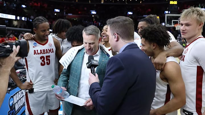 The Alabama Basketball Team huddles around Alabama basketball coach Nate Oats during an interview following the game against Saint Mary's at Rocket Arena in Cleveland, OH on Sunday, Mar 23, 2025. The Alabama Basketball Team huddles around Alabama basketball coach Nate Oats during an interview following the game against Saint Mary's at Rocket Arena in Cleveland, OH on Sunday, Mar 23, 2025.
