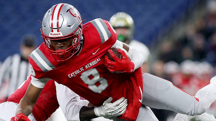 CM’s Ramar Thomas is sent flying on a tackle by Bishop Feehan’s Andrew Orphanos during second quarter action of the Division 2 football championship game between Catholic Memorial and Bishop Feehan at Gillette Stadium in Foxborough on Saturday, December 6, 2025. CM’s Ramar Thomas is sent flying on a tackle by Bishop Feehan’s Andrew Orphanos during second quarter action of the Division 2 football championship game between Catholic Memorial and Bishop Feehan at Gillette Stadium in Foxborough on Saturday, December 6, 2025.