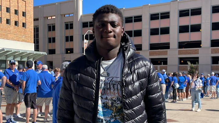 Five-star offensive tackle Michael Fasusi