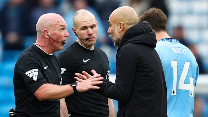 Pep Guardiola (right) was not impressed with Simon Hooper's leniency on Saturday Pep Guardiola (right) was not impressed with Simon Hooper's leniency on Saturday
