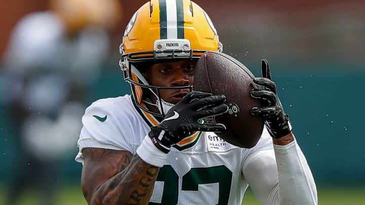 Green Bay Packers running back MarShawn Lloyd (32) catches a pitch during the first day of training camp on Wednesday, July 23, 2025, at Ray Nitschke Field in Ashwaubenon, Wis. 