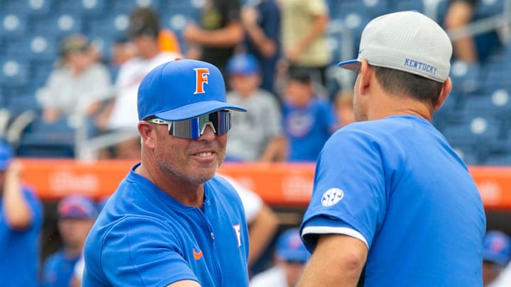 Florida head coach Kevin O'Sullivan (7) and Kentucky head coach Nick Mingione (27) shake heads before the start of Game 1, Friday, May 10, 2024, at Condron Family Ballpark in Gainesville, Florida. The Gators lost 12-11 in extra innings. [Cyndi Chambers/ Gainesville Sun] 2024