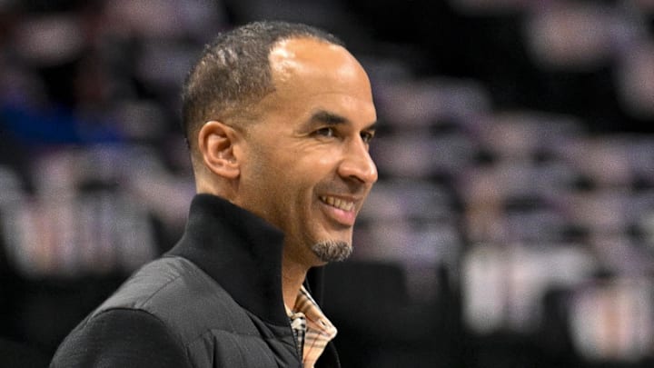Mar 9, 2025; Dallas, Texas, USA; Dallas Mavericks general manager Nico Harrison (left) speaks with Phoenix Suns assistant coach David Fizdale (right) before the game at the American Airlines Center. Mandatory Credit: Jerome Miron-Imagn Images