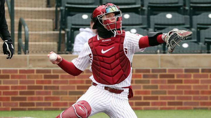 Sooner catcher Easton Carmichael throws as the University of Oklahoma Sooners (OU) baseball team plays Rider at L. Dale Mitchell Park on Feb. 24, 2023 in Norman, Okla.  [Steve Sisney/For The Oklahoman]

Ou Practice