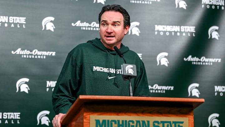 Michigan State coach Jonathan Smith talks the media on the first national signing day for college