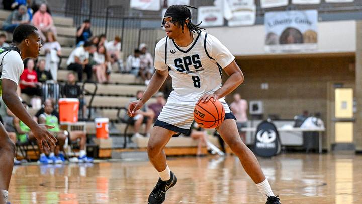 Team SPS and Michigan State's Julius Avent moves the ball against Team BLT’s during the Moneyball Pro-Am on Tuesday, June 23, 2026, at Holt High School.