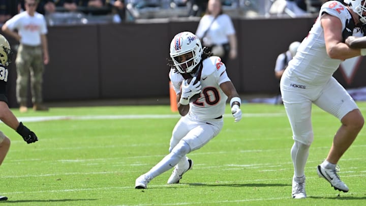 Sep. 20, 2025; Blacksburg, Va.; Virginia Tech running back P.J. Prioleau (20) runs the ball during the first quarter.