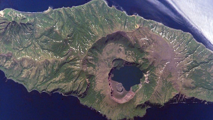 The Zavaritskii Caldera on Simushir Island, the site of a climate-altering 1831 volcanic eruption, as seen from the International Space Station.