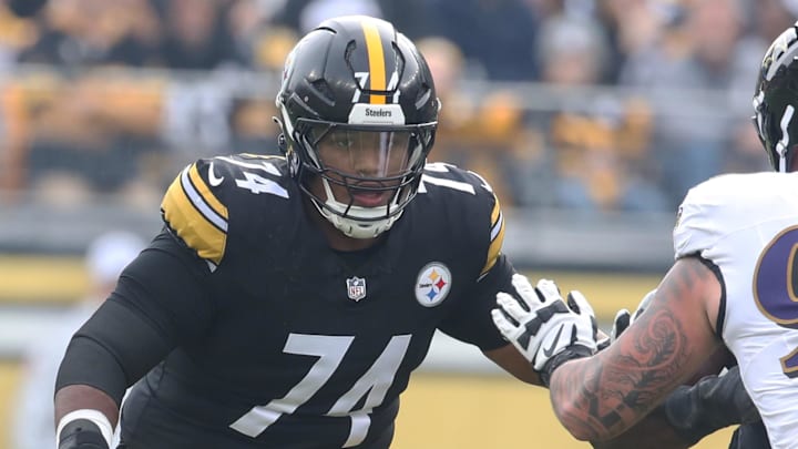 Nov 17, 2024; Pittsburgh, Pennsylvania, USA;  Pittsburgh Steelers guard Spencer Anderson (74) blocks at the line of scrimmage against Baltimore Ravens defensive end Brent Urban (97) during the second quarter at Acrisure Stadium. Mandatory Credit: Charles LeClaire-Imagn Images
