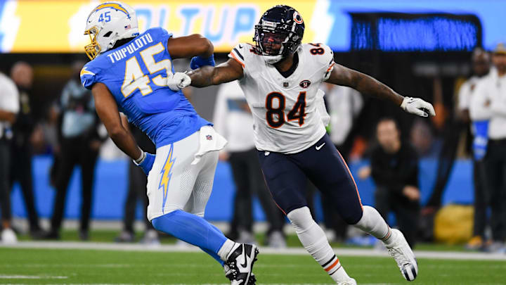Marcedes Lewis attempts to block against the Chargers last season for the Bears at age 39. According to Jay Glazer, he'll return this year.