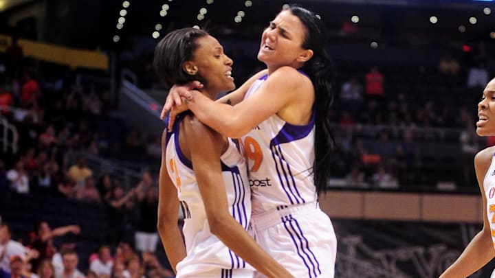Jun. 20, 2012; Phoenix, AZ, USA; Phoenix Mercury guard Samantha Prahalis (99) celebrates with teammate guard DeWanna Bonner (24) during the game against the Washington Mystics during the second half at US Airways Center. The Mercury defeated the Mystics 79-77. Mandatory Credit: Jennifer Stewart-Imagn Images