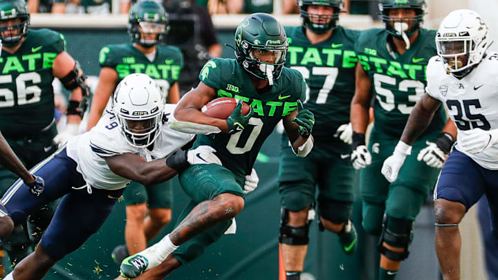 Michigan State wide receiver Keon Coleman runs against Akron linebacker Jeslord Boateng (9) during the first half at Spartan Stadium in East Lansing on Saturday, Sept. 10, 2022. Michigan State wide receiver Keon Coleman runs against Akron linebacker Jeslord Boateng (9) during the first half at Spartan Stadium in East Lansing on Saturday, Sept. 10, 2022.