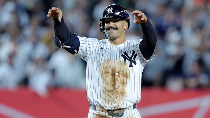 Oct 1, 2025; Bronx, New York, USA; New York Yankees center fielder Trent Grisham (12) celebrates his double against the Boston Red Sox during the seventh inning of game two of the Wildcard round of the 2025 MLB playoffs at Yankee Stadium. Mandatory Credit: Brad Penner-Imagn Images