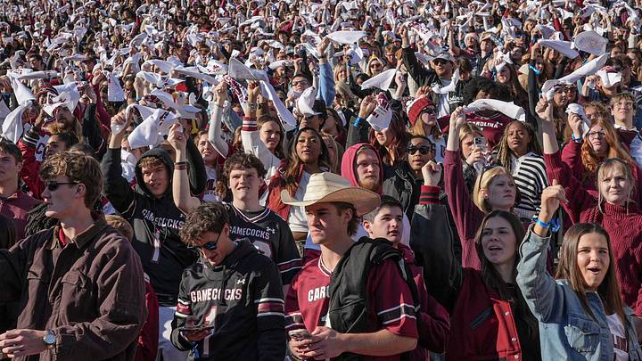 South Carolina fans waves white towels during the third quarter at Williams-Brice Stadium in Columbia, S.C. Saturday, November 29, 2025. South Carolina fans waves white towels during the third quarter at Williams-Brice Stadium in Columbia, S.C. Saturday, November 29, 2025.