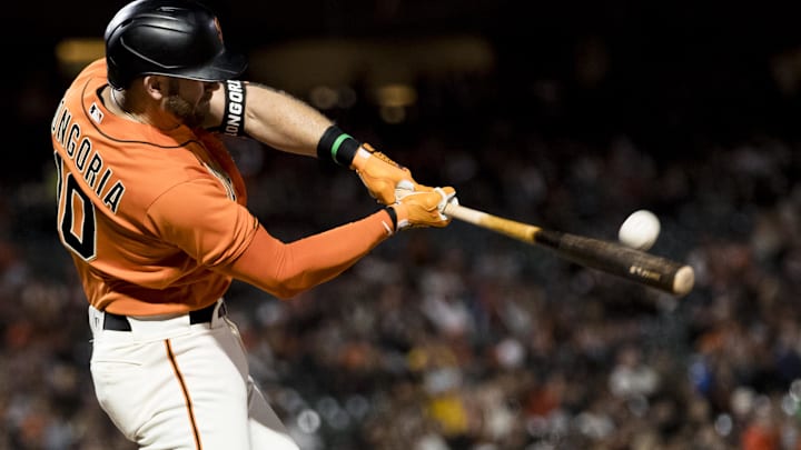 Sep 30, 2022; San Francisco, California, USA; San Francisco Giants third baseman Evan Longoria (10) hits a three-run home run against the Arizona Diamondbacks during the first inning at Oracle Park. Mandatory Credit: John Hefti-Imagn Images