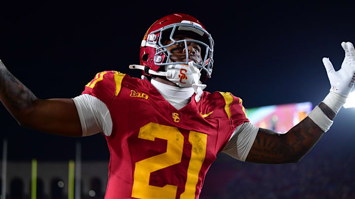 Nov 7, 2025; Los Angeles, California, USA; Southern California Trojans running back Bryan Jackson (21) celebrates the touchdown scored by wide receiver Makai Lemon (6) against the Northwestern Wildcats during the second half at the Los Angeles Memorial Coliseum. Nov 7, 2025; Los Angeles, California, USA; Southern California Trojans running back Bryan Jackson (21) celebrates the touchdown scored by wide receiver Makai Lemon (6) against the Northwestern Wildcats during the second half at the Los Angeles Memorial Coliseum.